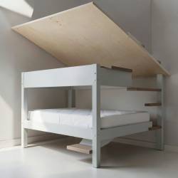 Indoor Loft Bed with Staircase and Sloped Ceiling